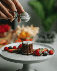 chef spraying on strawberry